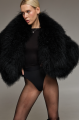 Women's short black fur coat made of natural llama fur